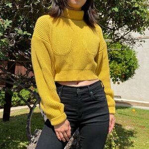 Simon Miller boob outline cropped knit turtleneck sweater.